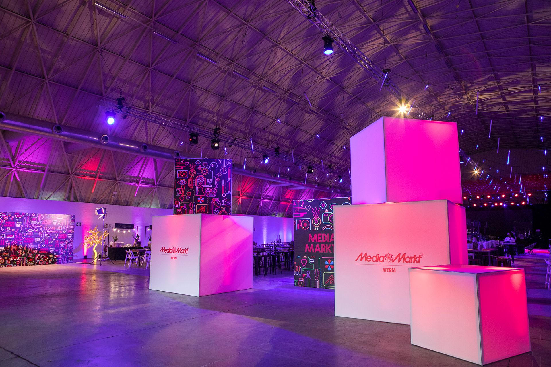 Corporate light box used as premium signage at an event registration desk.
